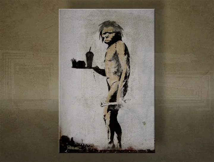 Obraz Banksy – Pračlovek s fast foodom (Caveman with Fast Food)